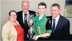  ?? Matthew Bousfield with proud parents Cath and Steven and Lionel Jarvis, Prior of SJA ??