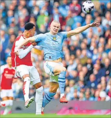  ?? REUTERS ?? Arsenal's Gabriel in action against Manchester City's Erling Haaland during their Premier League match.