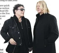  ?? BRIAN ACH/THE ASSOCIATED PRESS ?? Journey lead guitarist Neal Schon, left, and Def Leppard singer Joe Elliott are excited about their joint 60-show tour this summer.