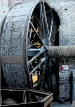  ??  ?? A giant wooden treadwheel still stands in the Minster. It was used to raise building materials through a hole above the nave.