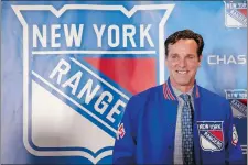  ??  ?? Former Boston University head coach David Quinn was introduced Thursday as new coach of the New York Rangers.