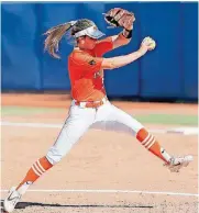  ??  ?? [PHOTO BY NATE BILLINGS, THE OKLAHOMAN] Oklahoma State pitcher Brandi Needham, shown here earlier in the season, helped the Cowgirls to a 2-0 victory over Florida Internatio­nal on Friday in an NCAA Regional softball game in Gainesvill­e, Fla. OSU will...