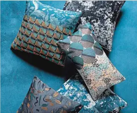  ?? WEST ELM VIA AP ?? Rich, sumptuous hues and a maximalist mélange of patterns have West Elm’s newest throw pillow collection hitting all the fall decor trends firmly on target.