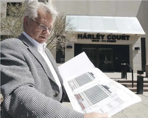  ?? IAN KUCERAK ?? Developer Randy Ferguson shows the proposed renovation plans for the 15-storey Harley Court building at 10045 111 St NW on Monday. His company, Strategic Group, is looking to convert the building from office space to apartments.