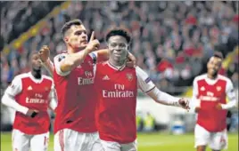  ?? GETTY IMAGES ?? ■ Granit Xhaka (left) will lead Arsenal in their clash against Manchester United.