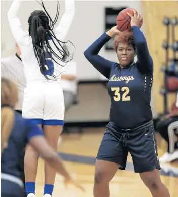  ?? ?? Wekiva girls basketball player K’Nari Holliday passes the ball during the first quarter of a non-conference game against rival Apopka on Jan. 25. SAM THOMAS/ORLANDO SENTINEL