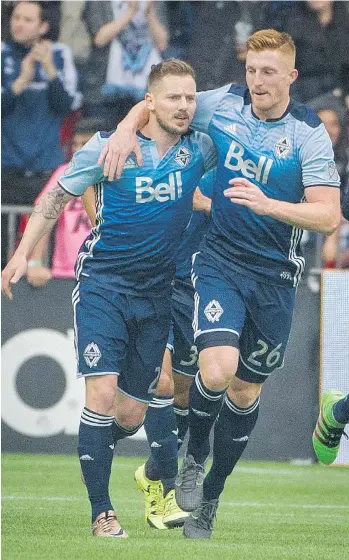  ?? RIC ERNST ?? Fullback Jordan Harvey, left, the second-longest serving Whitecap — seen with fellow defender Tim Parker — rejects the idea that his team’s struggles last year were due to a lack of chemistry.