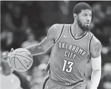  ?? ISAIAH J. DOWNING, USA TODAY SPORTS ?? The new season will answer how Paul George, above, and fellow newcomer Carmelo Anthony joining league MVP Russell Westbrook will affect the Thunder.