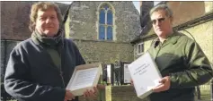  ?? Picture: Chris Davey FM4716736 ?? Canterbury Archaelogi­cal Trust director Paul Bennett and Dr Andrew Richardson, the trust’s outreach manager, with the petition to keep the Canterbury Heritage Museum in Stour Street open