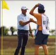  ?? STEPHEN B. MORTON — THE ASSOCIATED PRESS ?? Stewart Cink, left, and his caddie and son Reagan Cink celebrate on the 18th green after the elder Cink won the RBC Heritage for the third time.