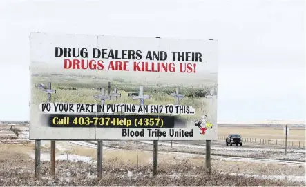  ?? GAVIN YOUNG ?? A 2017 billboard on the Blood Tribe reserve calls attention to the issues plaguing the southern Alberta reserve. The reserve has declared a state of emergency due to a spike in drug overdoses.