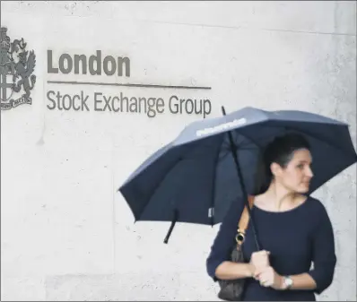  ?? PICTURE: AFP VIA GETTY IMAGES ?? UNDER A CLOUD: In terms of points lost, it was the FTSE 100’s second worst week since being founded in 1984.