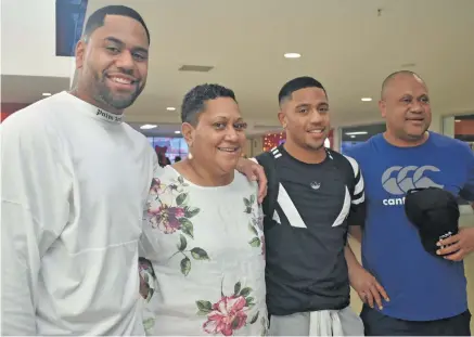  ?? Photo: ?? England rugby winger Joe Cokanasiga, mum Kiti Cokanasiga, brother Phil and dad Ilaitia Cokanasiga at the Nadi Internatio­nal Airport on December 18, 2019. Waisea Nasokia