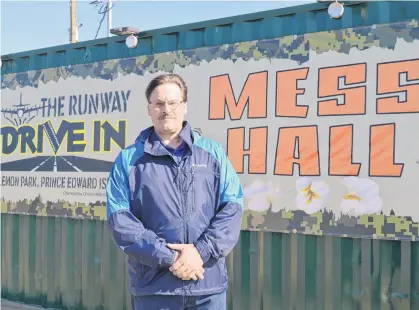  ?? DAVE STEWART • SALTWIRE NETWORK ?? Paul Arsenault, owner of the Runway Drive-In in Slemon Park, has replaced the inflatable screen he used last year with a newly constructe­d screen made from sea cans.