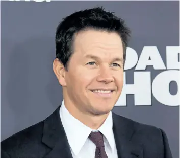  ?? ASSOCIATED PRESS FILE ?? Mark Wahlberg will sit down for an intimate chat in front of an audience at the Toronto Internatio­nal Film Festival. The Oscar-nominated actor-director, who will be seen at the festival in Deepwater Horizon, is among the stars in the In Conversati­on...