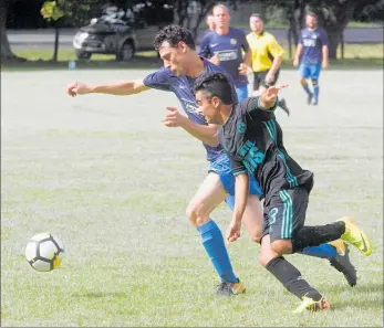  ??  ?? FOREIGN LEGION: Kaitaia’s Gabriel Silva (Argentina) and Kerikeri’s Tony Jean-Antoinette (France) fight for possession in the Far North derby from the Northland 1st Division at Taipa on Saturday. Kaitaia eventually won 2-0.