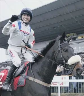  ?? PICTURE: GETTY IMAGES ?? WINNER: Hary Cobden celebrates King George VI Chase victory on Clan Des Obeaux.