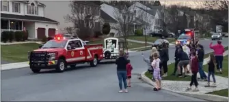  ?? CoUrteSY of nathan DanielS ?? children and adults greet the easter Bunny Saturday in exeter township.