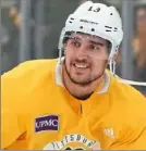  ?? Peter Diana/Post-Gazette ?? Penguins left wing Brandon Tanev goes through drills during morning