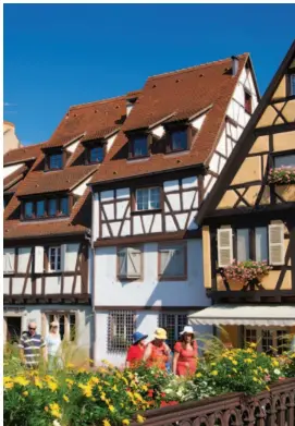  ??  ?? Up Close and Personal A Viking boat idles below Katz Castle in Germany (above, left) before disembarki­ng passengers to stroll the village of Colmar, France (above, right).