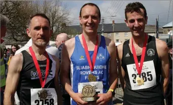  ??  ?? Half marathon winners: Brendan Lyng (3rd) Myles Gibbons (1st) and Karl Mannion (2nd).