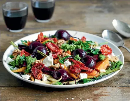  ??  ?? This root vegetable salad with feta & sun-dried tomatoes and walnut, parsley and basil pesto is almost too pretty to eat.