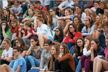  ?? MARIAN DENNIS — DIGITAL FIRST MEDIA ?? Students at Owen J. Roberts High School watch as their classmates and other actors create a mock crash that ends with the death of two students and the arrest of another. The presentati­on was aimed at showing the consequenc­es of drinking and driving.