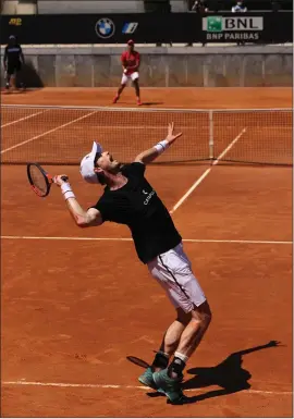  ??  ?? Andy Murray hits with Novak Djokovic during a practice session