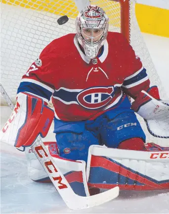  ??  ?? Le gardien Carey Price, du Canadien de Montréal, effectue l’un de ses 36 arrêts, samedi, face aux Sabres de Buffalo. - La Presse canadienne: Graham Hughes