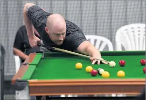  ?? ?? DRAWCARD: Australian number-one Mark Robertson plays in the Wimmera Friendly Eight-ball Invitation­al in Horsham.