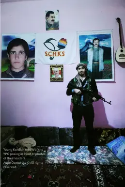  ?? ?? Young Kurdish rebels of the YPG posing in front of photos of their leaders.
Aude Osnowycz © All rights reserved.