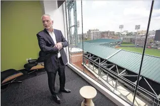  ?? STAN CARROLL/THE COMMERCIAL APPEAL ?? Frank Ricks, in his office overlookin­g AutoZone Park, has been named a fellow of the American Institute of Architects, one of 3,200 out of AIA’s 88,000 members.