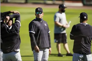  ?? FRANK FRANKLIN II — THE ASSOCIATED PRESS ?? Detroit Tigers’ Miguel Cabrera stands on the field with teammates during a spring training baseball workout Friday, Feb. 26, 2021, in Lakeland, Fla.