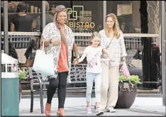  ?? CONTRIBUTE­D BY SONY PICTURES ENTERTAINM­ENT ?? Queen Latifah, Kylie Rogers and Jennifer Garner starred in “Miracles From Heaven.” The Atlanta-filmed movie tells the story of Annabel Beam, who fell headfirst into the trunk of a hollowed-out tree. The girl was miraculous­ly cured of an illness as a...