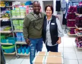  ??  ?? With help from Ackermans Garden Route Mall, Kaalvoet Mzansi made a generous donation towards the families who lost their belongings in the inferno on Tuesday 15 May in Rosedale. Anele Ngoyo (Kaalvoet Mzansi founder) accepted the donation from Leoni van...