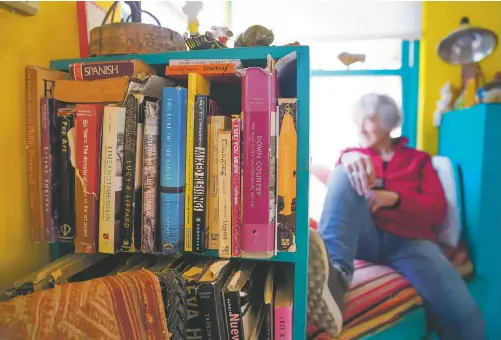  ??  ?? Lippard at her Galisteo home, photo Gabriela Campos/ The New Mexican; top, El Puente de Galisteo, Summer 2003, from Pueblo Chico: Land and Lives in Galisteo since 1814 by Lucy R. Lippard (Museum of New Mexico Press, 2020), courtesy of the publisher.