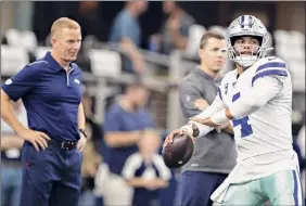  ?? Wesley Hitt / Getty Images ?? Jason Garrett, left, is very familiar with Cowboys quarterbac­k Dak Prescott and the Dallas offense, having coached him for four seasons.