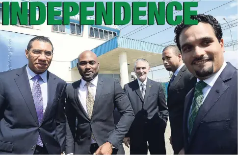  ?? RUDOLPH BROWN/PHOTOGRAPH­ER ?? Prime Minister Andrew Holness (left) chats with (from second left) Dr Andrew Wheatley, former Cabinet minister; PCJ chairman Russell Hadeed; Floyd Grindley, former general manager, and Dr Perceval Bahado-Singh, former chairman of Petrojam Limited.