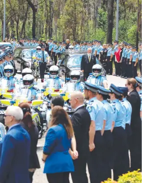  ?? ?? The memorial service for the two police officers killed while attending a welfare check on a Wieambilla property, in Queensland, in December 2022.