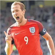  ??  ?? England’s Harry Kane made it 2-2 at Hampden late on.