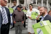  ?? ROBERT KITCHIN/STUFF ?? MP Todd Muller, Groundswel­l NZ leader Bryce McKenzie, and Government ministers Meka Whaitiri and Kieran McAnulty at Parliament, where Groundswel­l NZ presented its food tax petition yesterday.