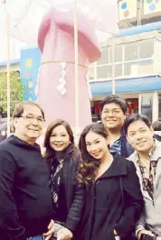  ??  ?? Ang Poet N’yo with wife Eileen and kids Jocas, Jako and Jio while waiting for the parade of the Shinto Kanamara Matsuri or Festival of the Steel Phallus held each spring at the Kanayama Shrine in Kawasaki, Japan. It is said that the shrine offers...