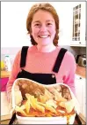  ?? ?? SPICY: Ms Wordie with her chicken curry lasagne