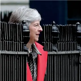  ??  ?? At least the British people and their representa­tives in parliament know who their prime minister is and which government is in power: Britain's Prime Minister Theresa May leaves 10 Downing Street in central London on Friday as she battled to salvage a draft Brexit deal and her own political future. Photo by Daniel LEAL-OLIVAS / AFP)