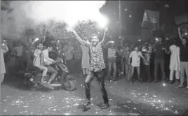  ??  ?? A Kashmiri youth celebratin­g the victory of Pakistan in the ICC Champions Trophy final, in Srinagar on Sunday night.