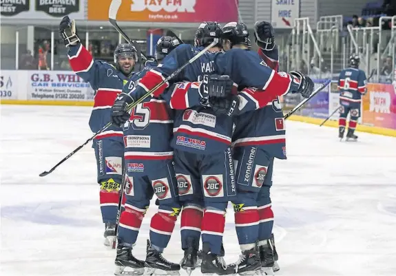  ?? Picture: Derek Black. ?? Dundee Stars celebrate their midweek victory over Belfast Giants as Omar Pacha’s side continue their winning streak.