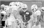  ?? MIKE STOCKER/SOUTH FLORIDA SUN SENTINEL ?? Dolphins quarterbac­k Tua Tagovailoa (1) missed Wednesday’s practice with an illness.