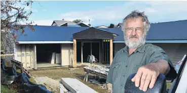  ?? PHOTO: GREGOR RICHARDSON ?? Getting there . . . Waikouaiti museum committee chairman Bill Lang at the site of the Waikouaiti Coastal Heritage Centre building under constructi­on behind the existing museum.