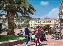  ??  ?? The harbour-side plaza brings residents together with backpacker­s and cruise passengers at Porto Azzurro, Elba.