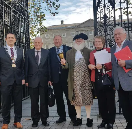  ??  ?? Deputy Mayor Richie Culhane, Dr Brian Hughes, Peter Monahan, Anna Mckenna and Vincent Hoey are joined by a Town Crier at the City Status plan launch.